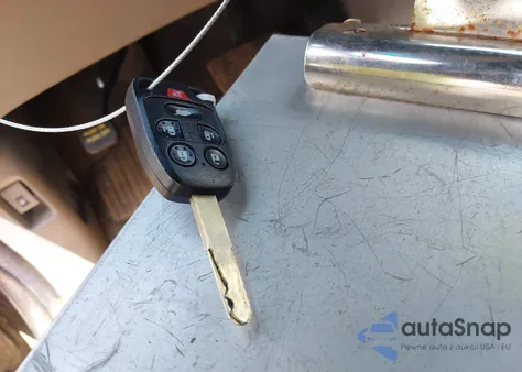 2012 Honda Odyssey Ex-L z USA, uszkodzony, nr VIN 5FNRL5H60CB084136